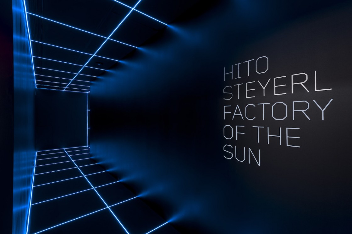 Blue Light Tape® creates a lighted grid across a room for the Factory of the Sun exhibit