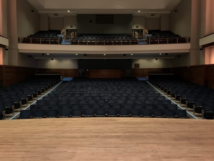 View from front of stage at the auditorium aeat and aisle lighting