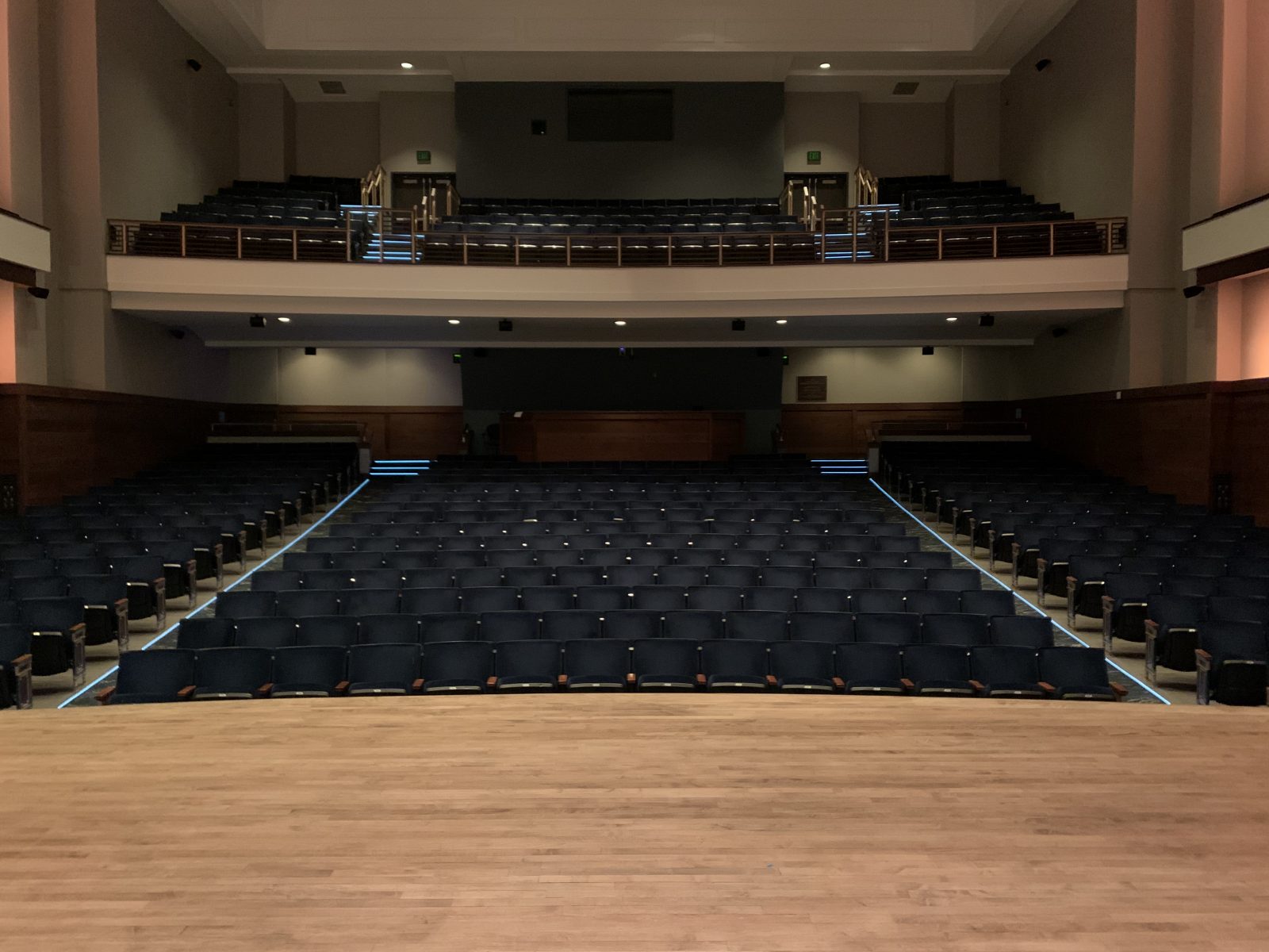View from front of stage at the auditorium aeat and aisle lighting